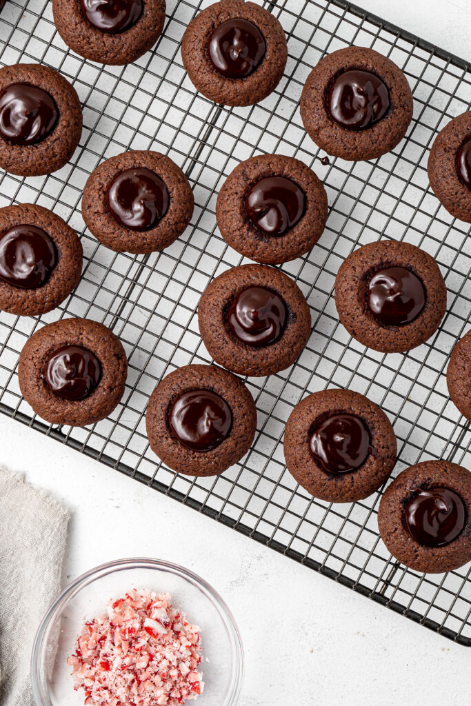 Filling the chocolate cookies with peppermint ganache.