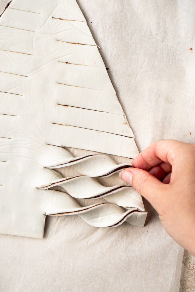 Twisting the branches of the pastry tree.