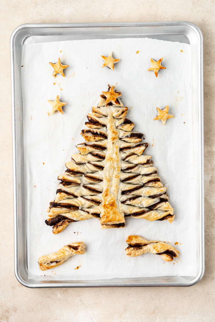 The baked puff pastry tree on a baking tray.