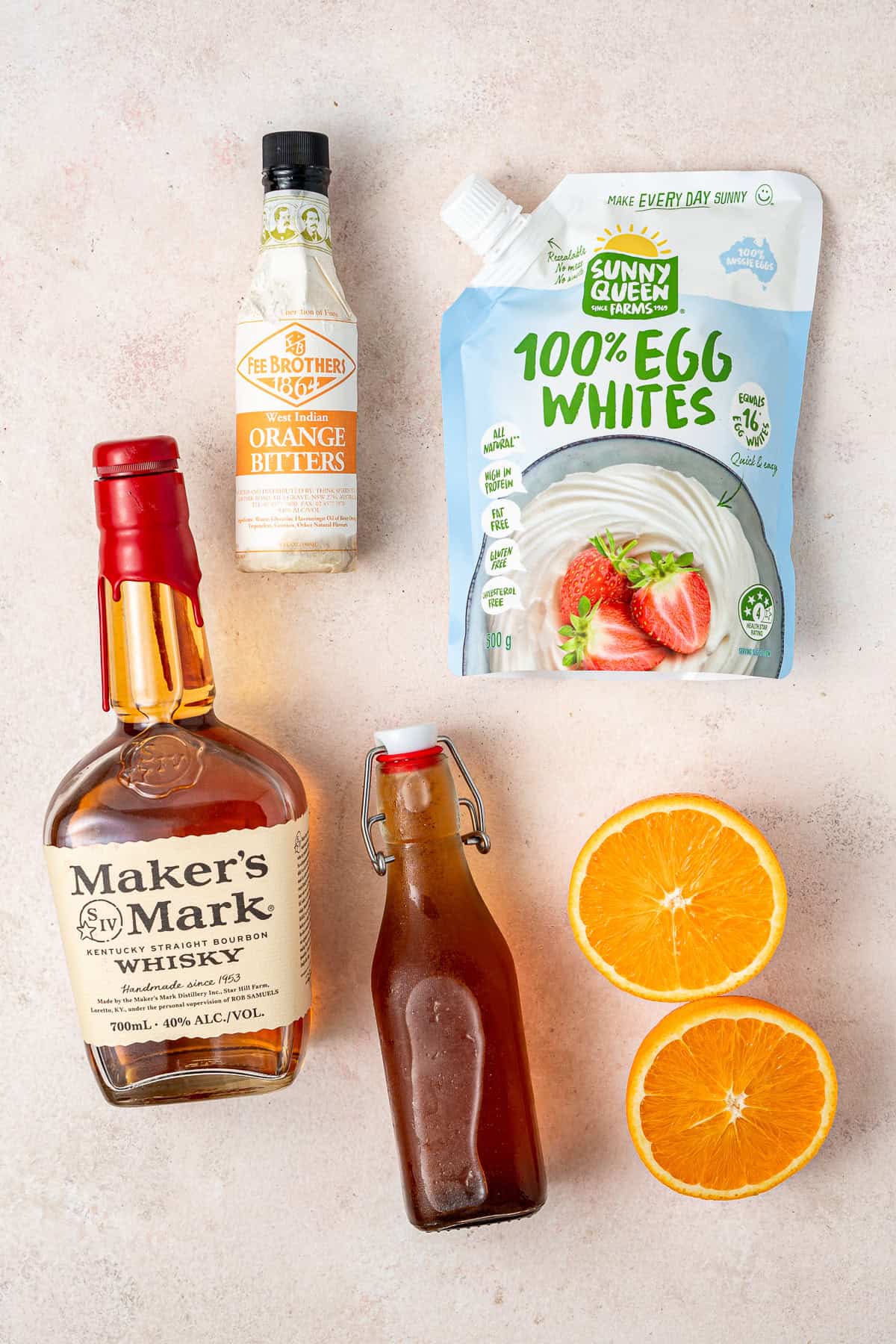 All ingredients needed to make a gingerbread whiskey sour laid out. 