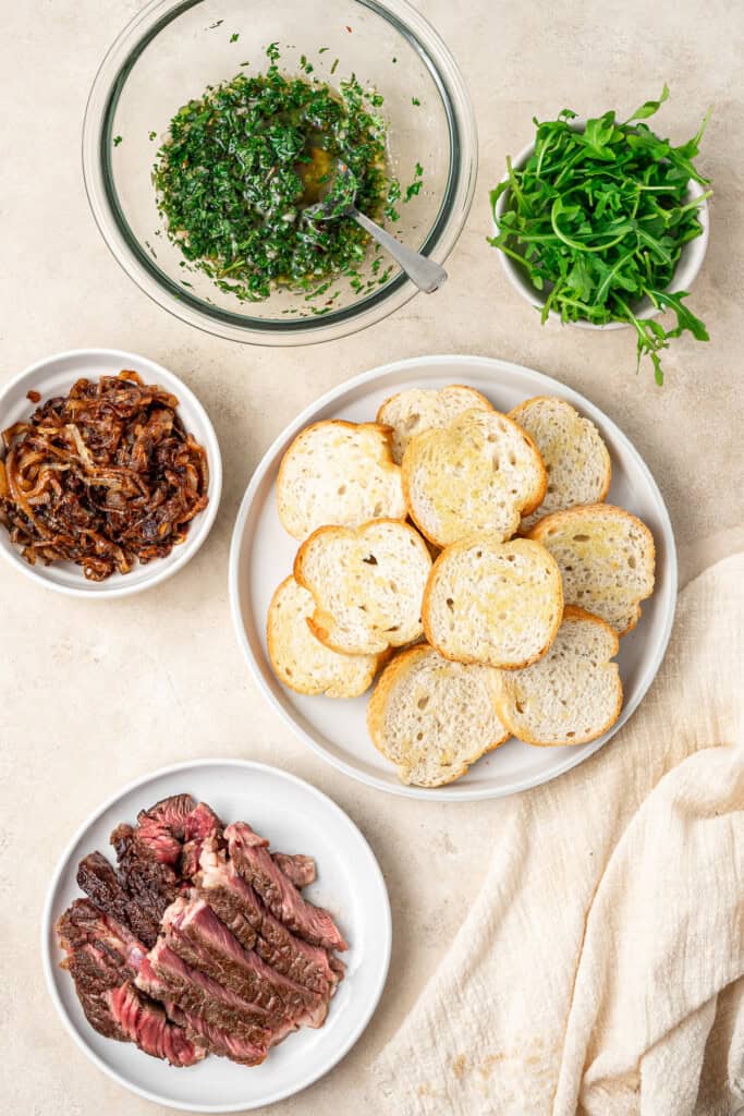 All elements for the steak crostini laid out ready to assemble.