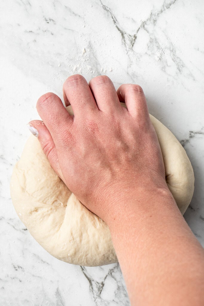 Kneading the dough by hand.