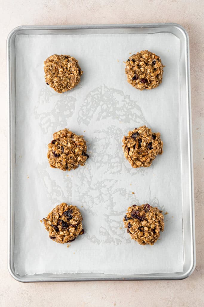 The cookie dough in a baking tray.