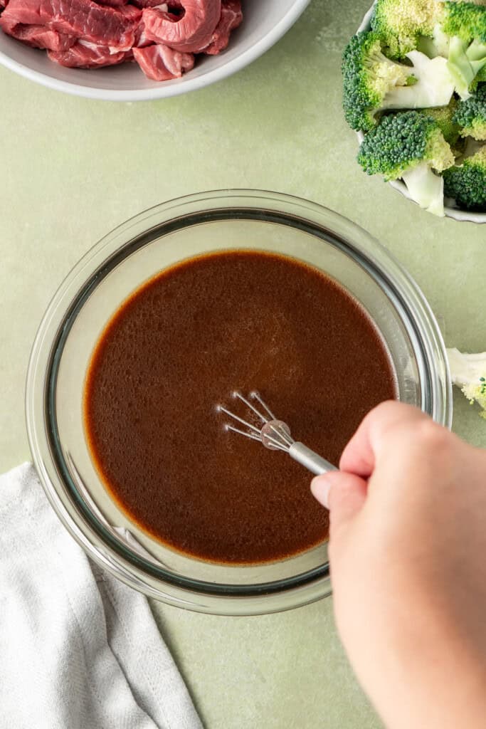 Mixing up the beef and broccoli sauce.