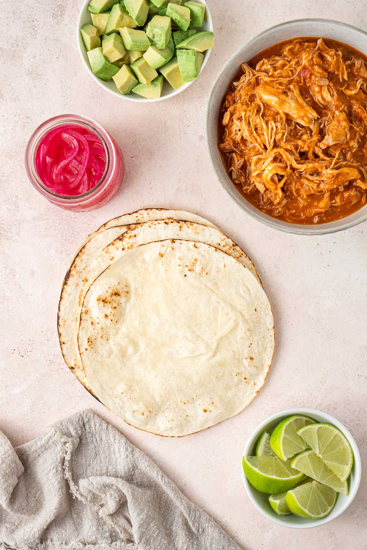 The warm tortillas and all ingredients ready to assemble.