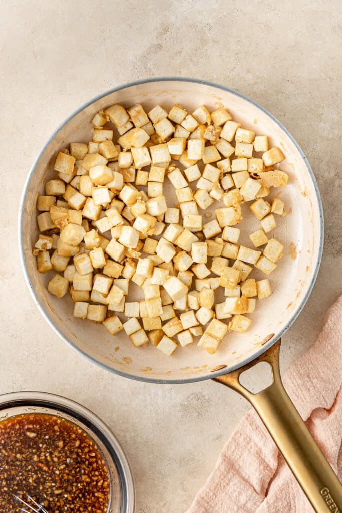 The cooked tofu in a pan.