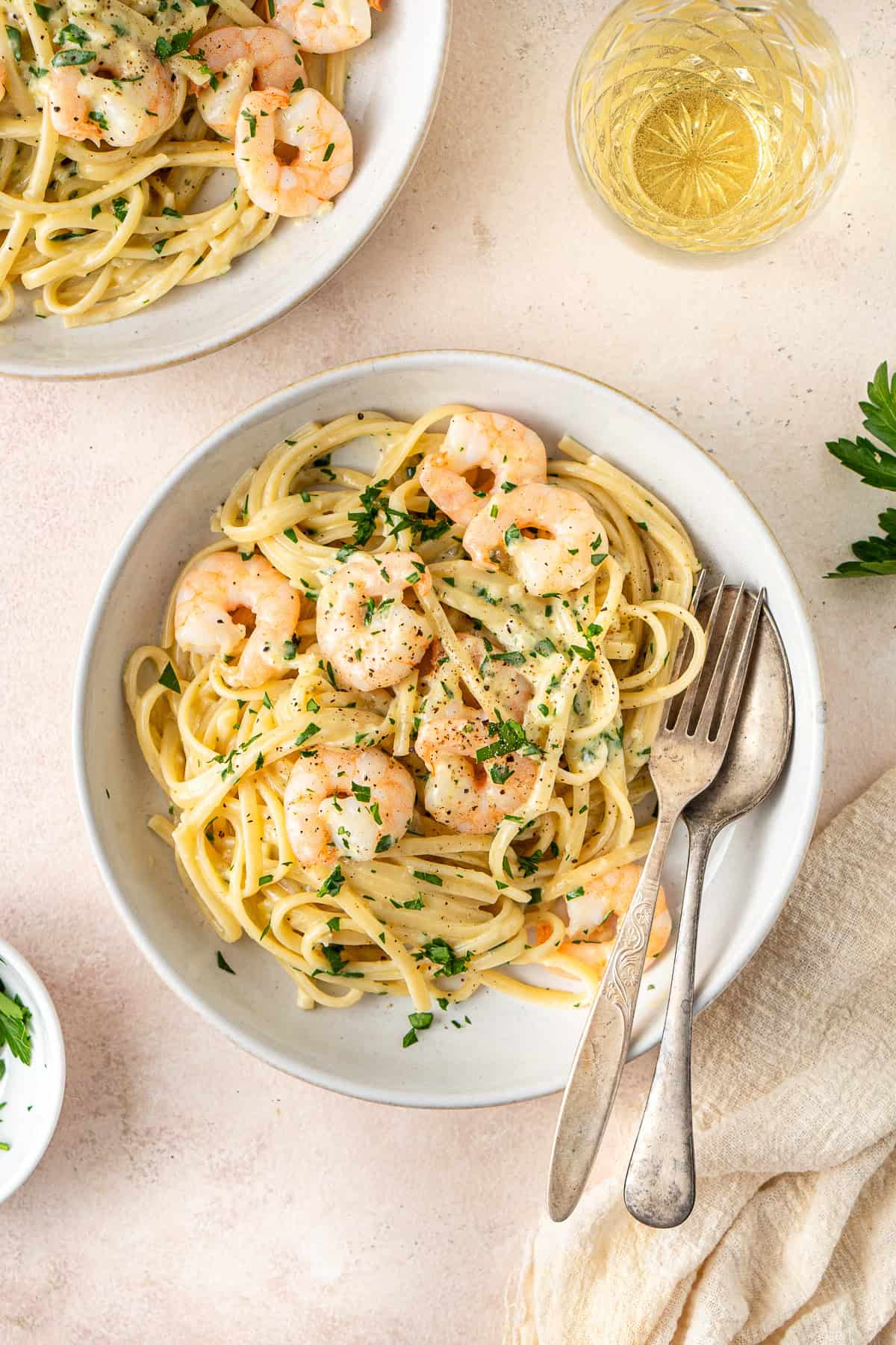 The creamy dairy free prawn pasta served into bowls.