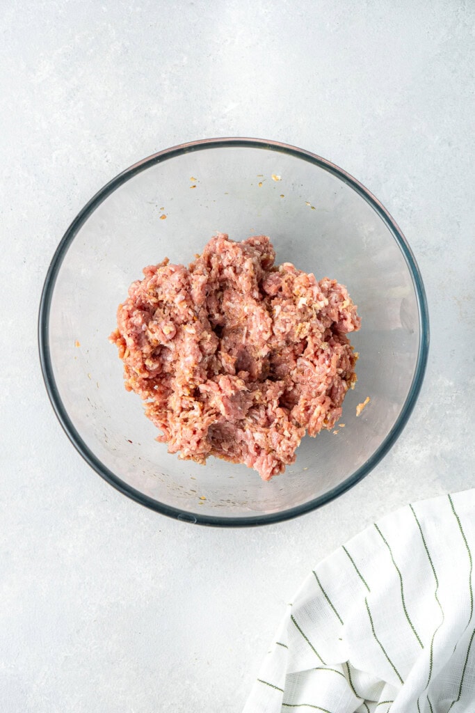 The meatball mixture in a mixing bowl.