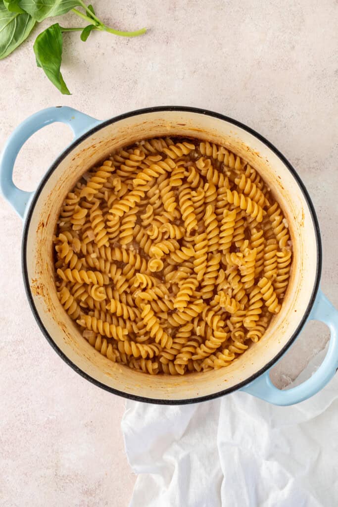 The cooked pasta in the pot.