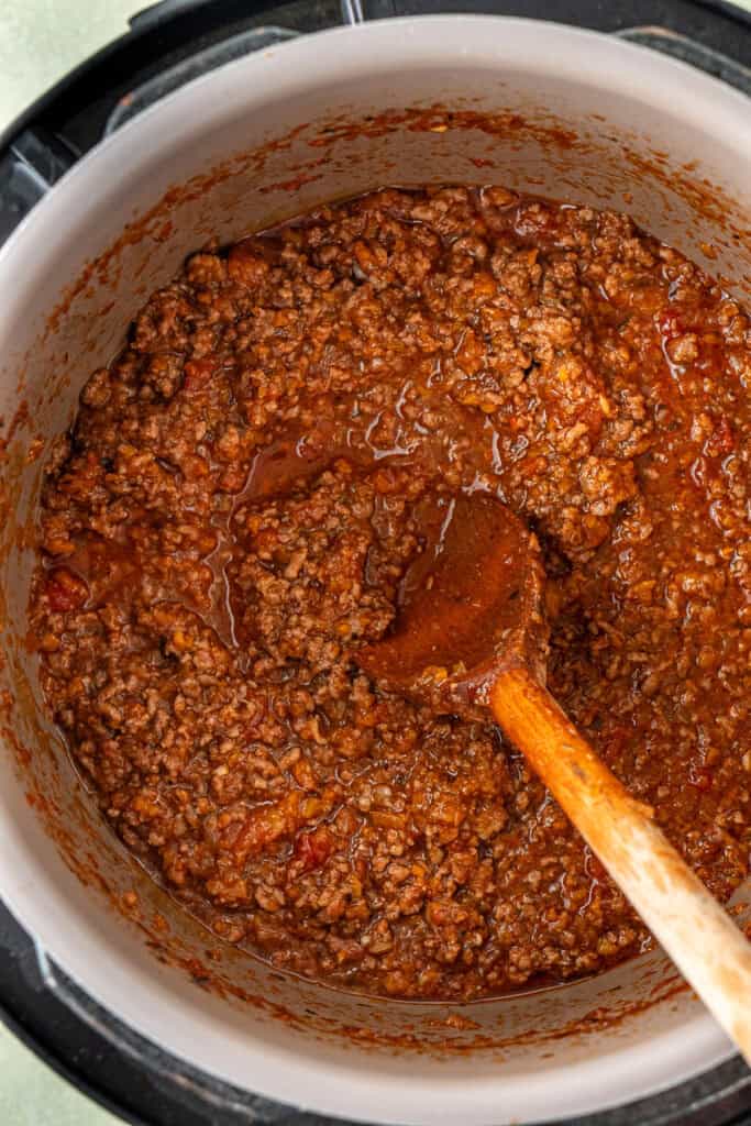 Close up of the thickened bolognese in the slow cooker.