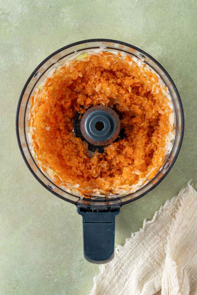 Using a food processor to finely hop the vegetables.