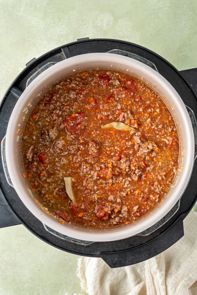 All of the ingredients in the slow cooker to make bolognese. 