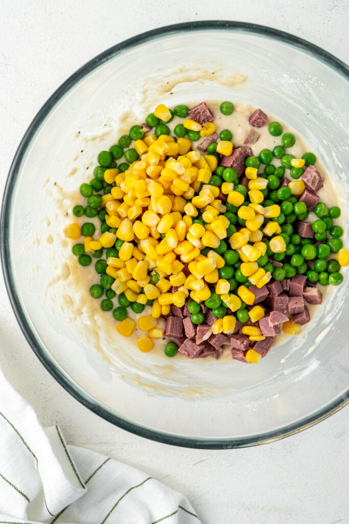 Peas, corn and corned beef in the batter bowl.