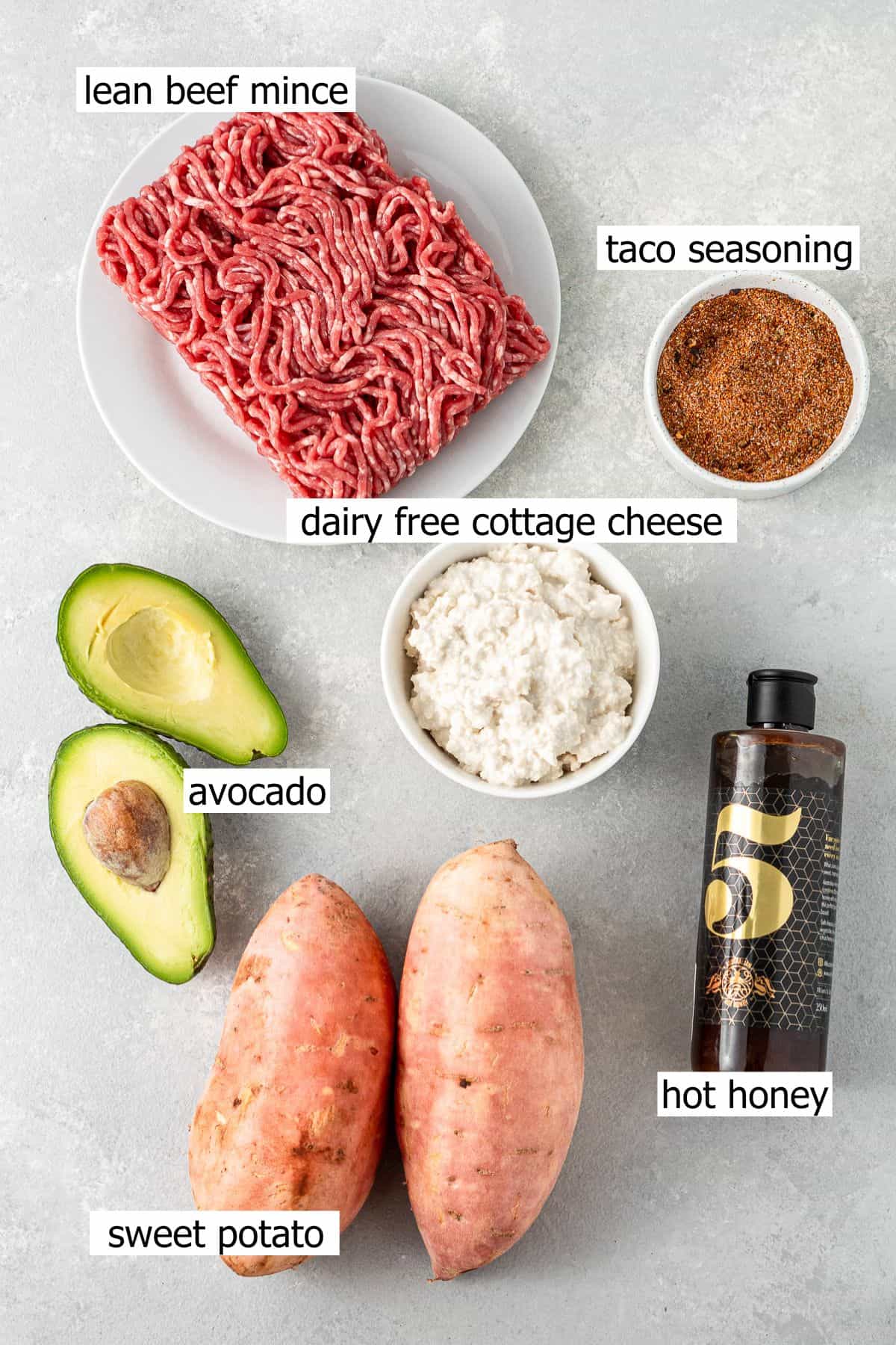 All ingredients needed to make dairy free hot honey sweet potato beef bowls laid out.