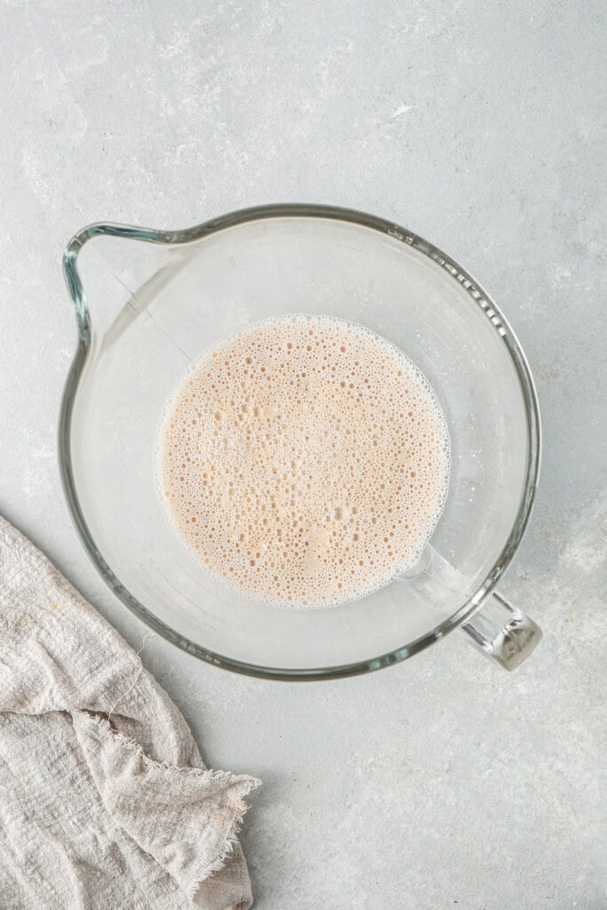 Blooming the yeast in the mixing bowl.