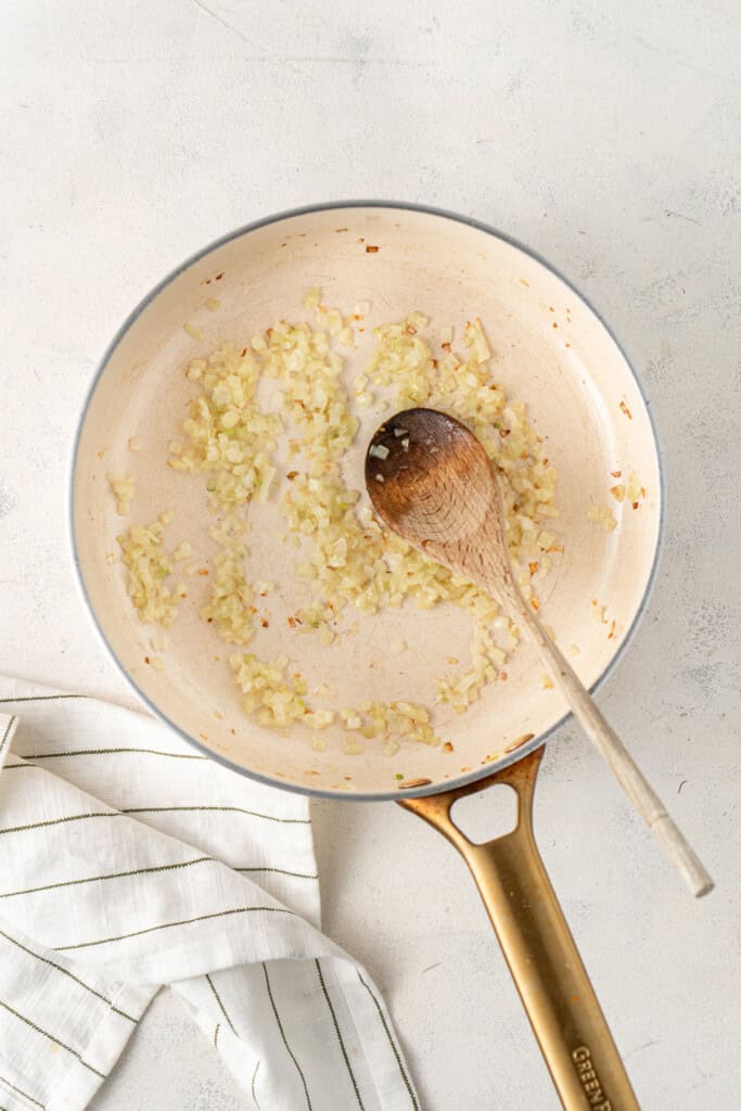 Sautéing the onions in a pan/