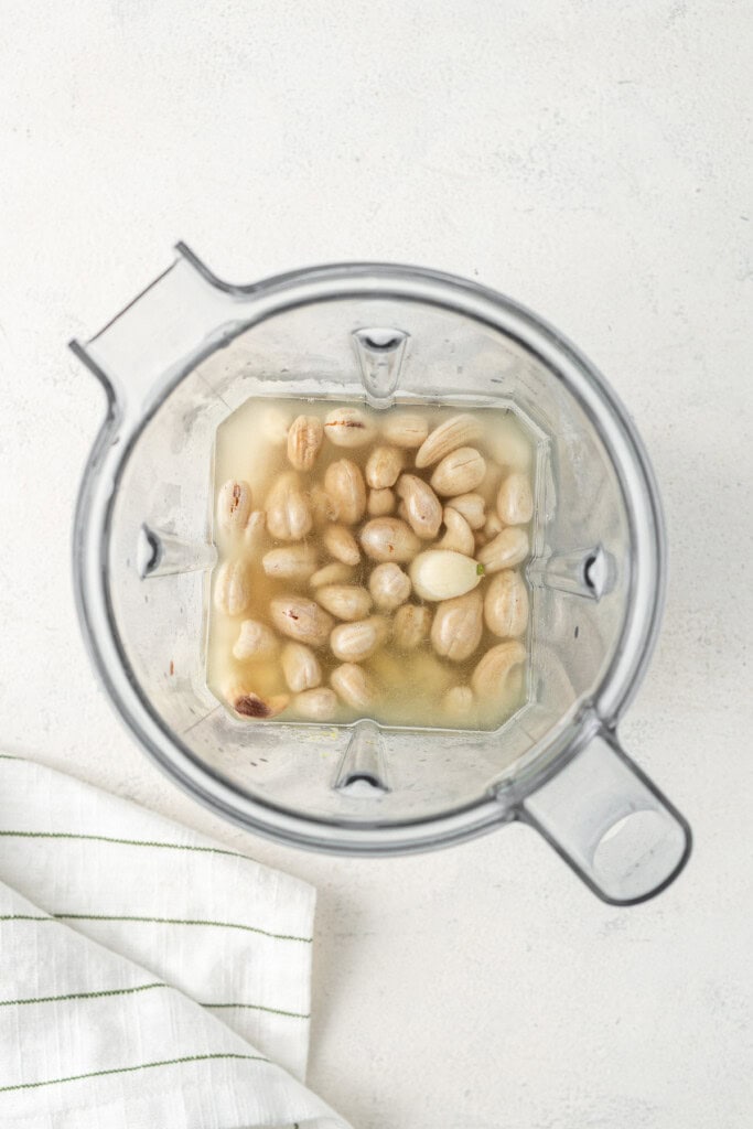 All ingredients for the cashew cheese sauce in the blender.
