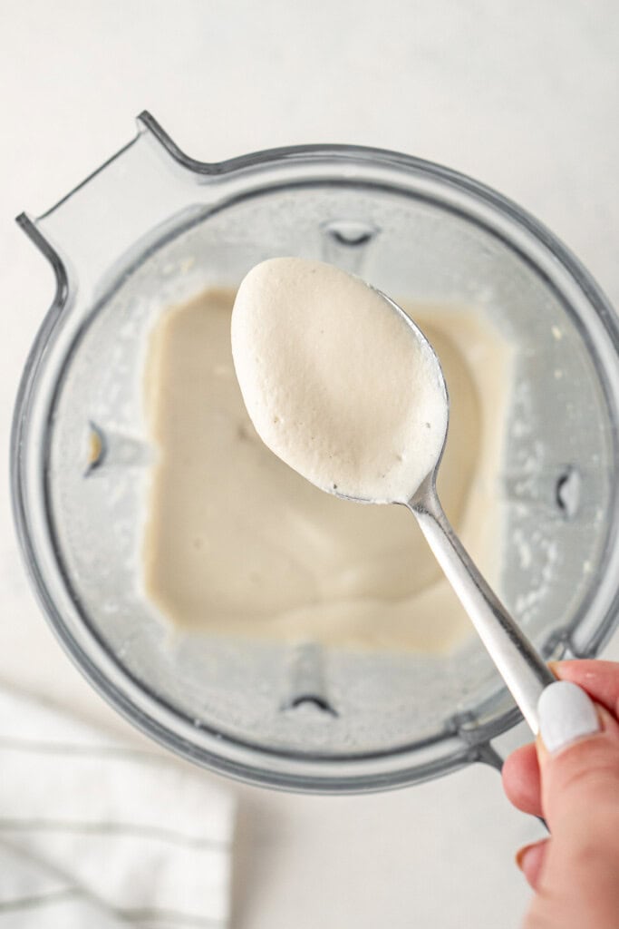 The creamy blended cashew cheese sauce in the blender.