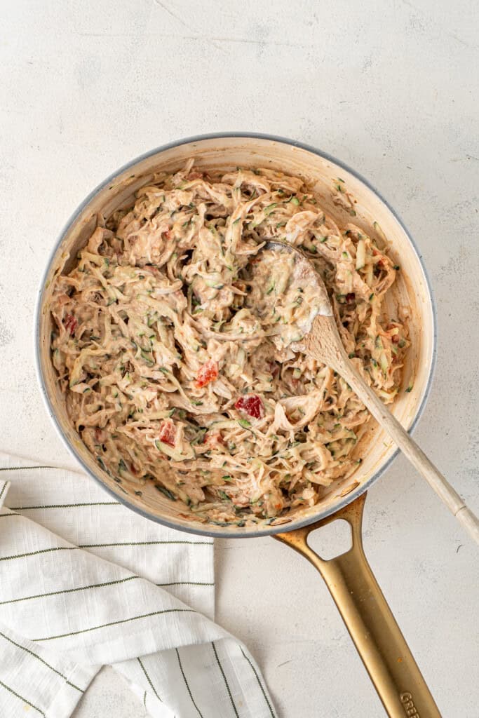 The enchilada filling in a frying pan.