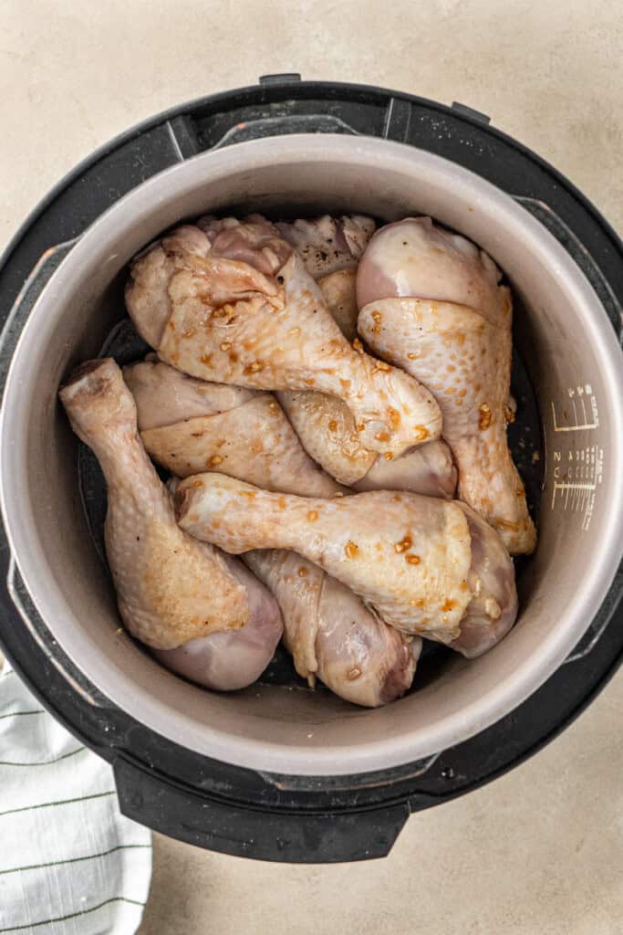 Chicken drumsticks in the slow cooker with the honey garlic sauce.