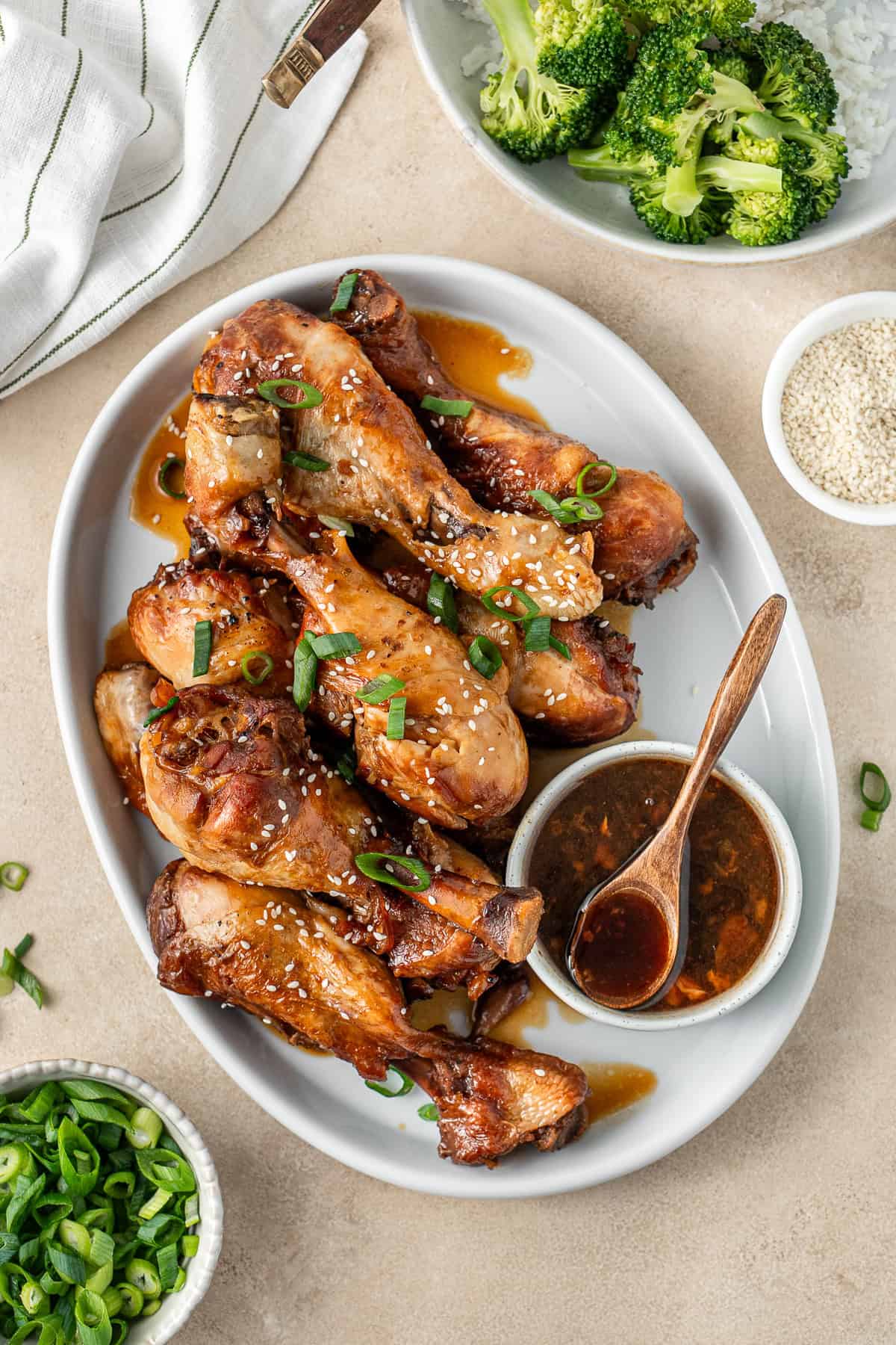 Honey garlic chicken drumsticks in a plate.