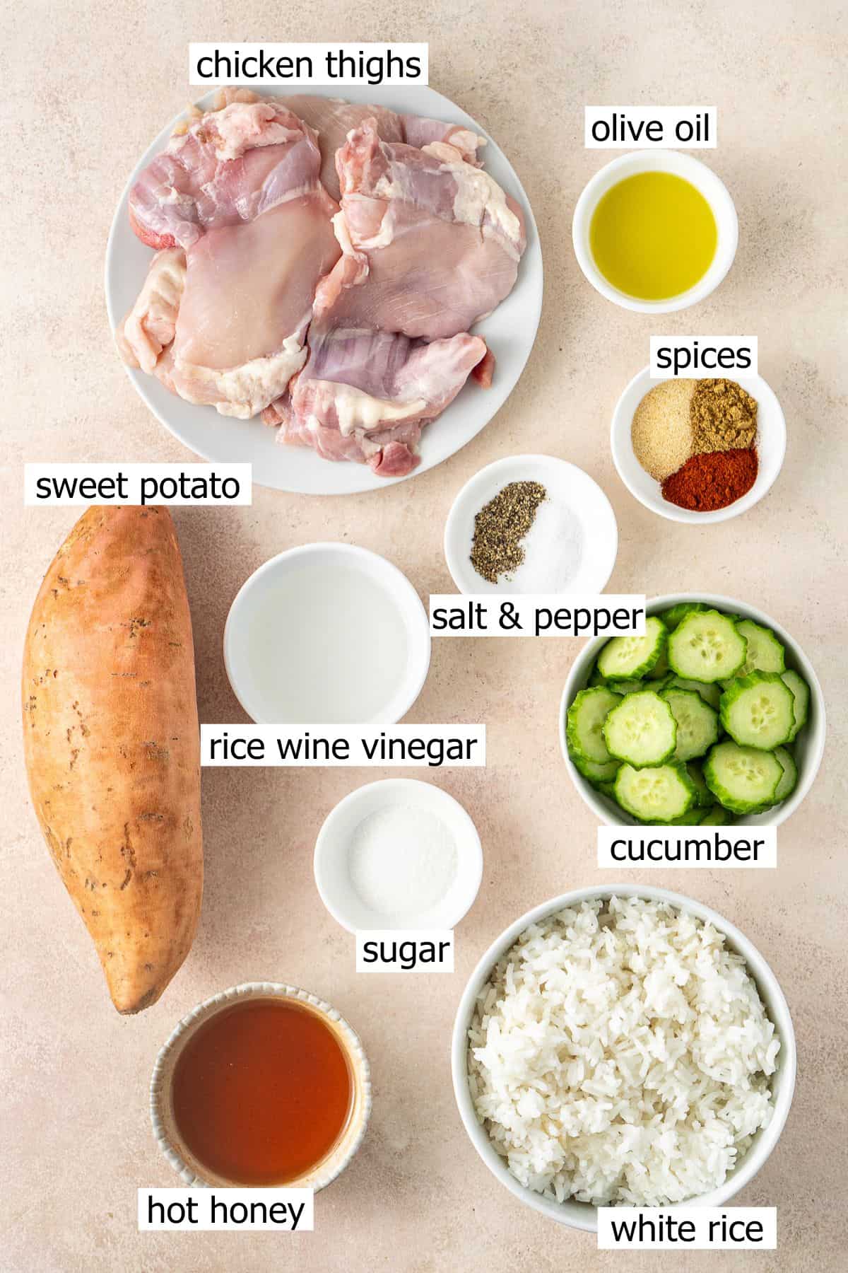 All ingredients needed to make hot honey chicken bowls laid out in small bowls.