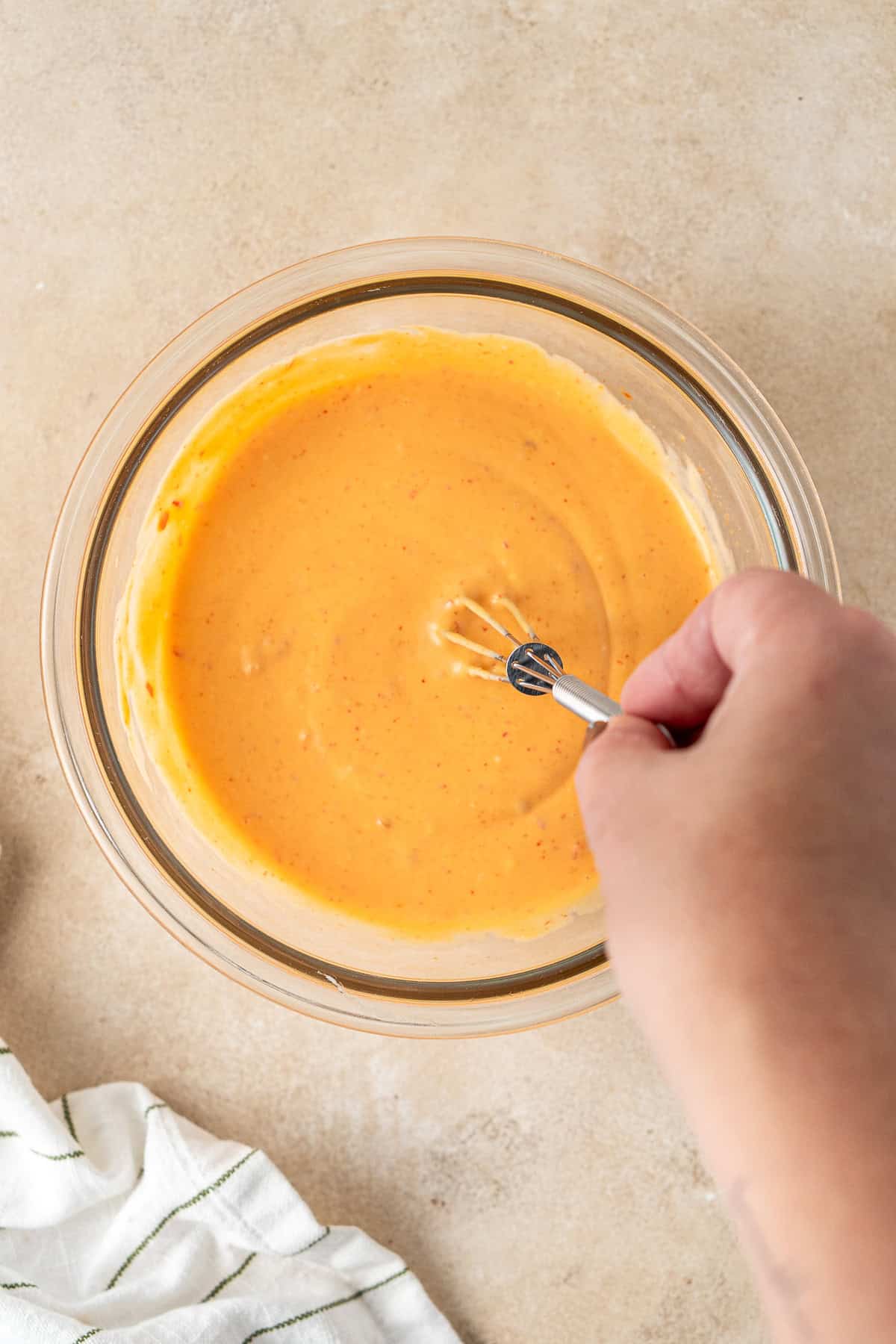 Mixing together the bang bang sauce.