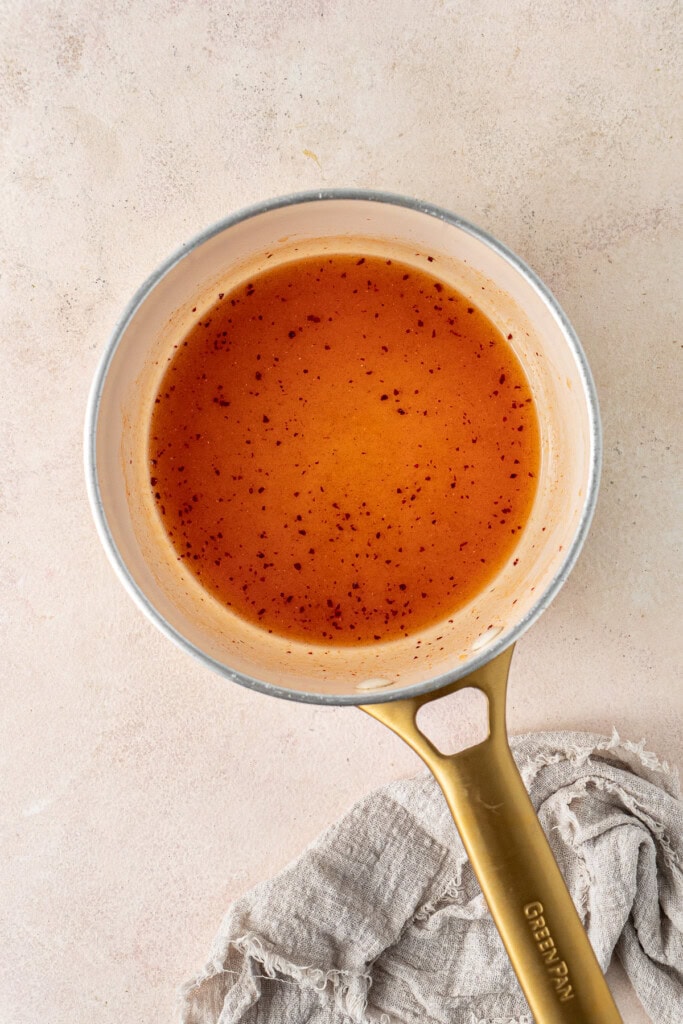 The hot honey in a small saucepan.