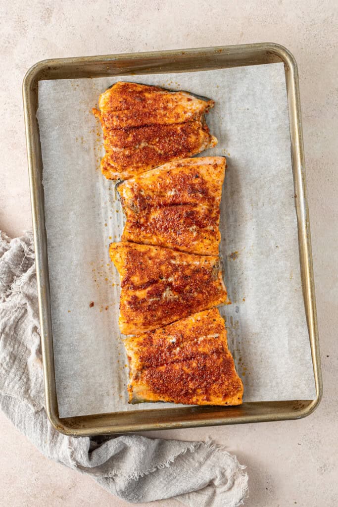 The baked salmon on a tray.