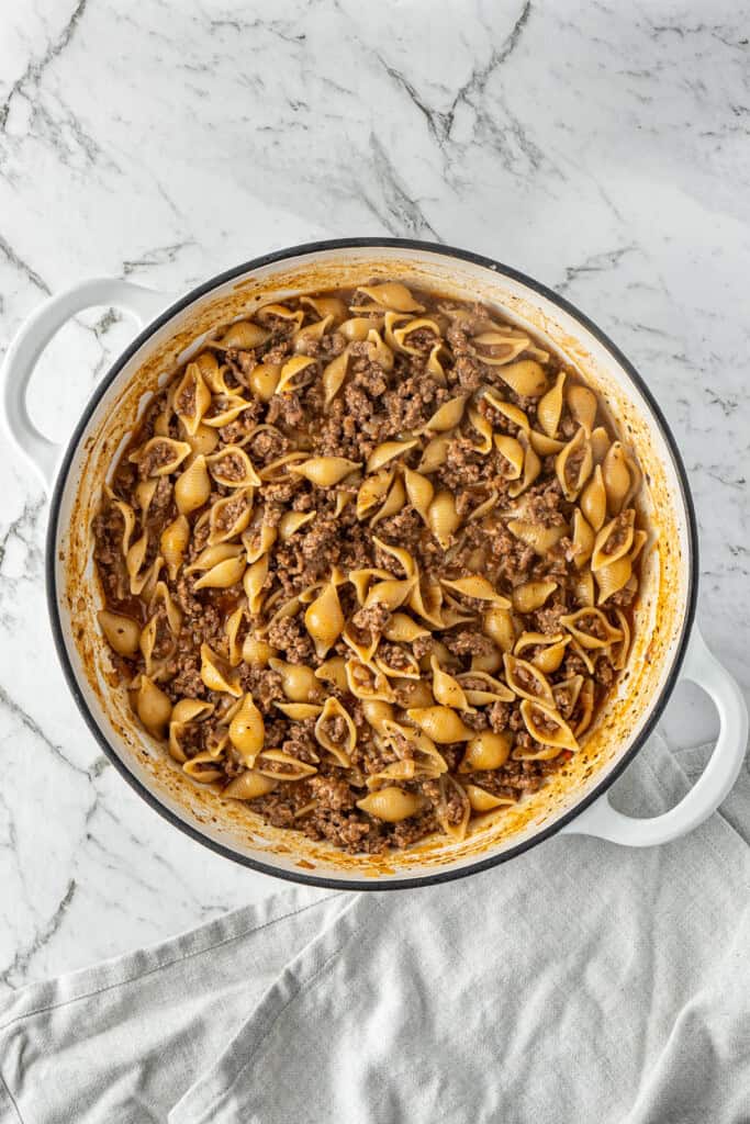 The pot of pasta finished cooking.