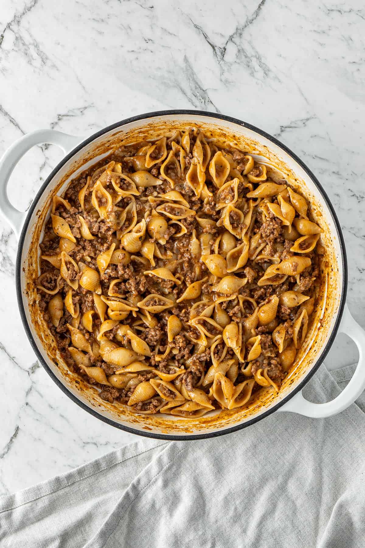 The pot of pasta finished cooking.