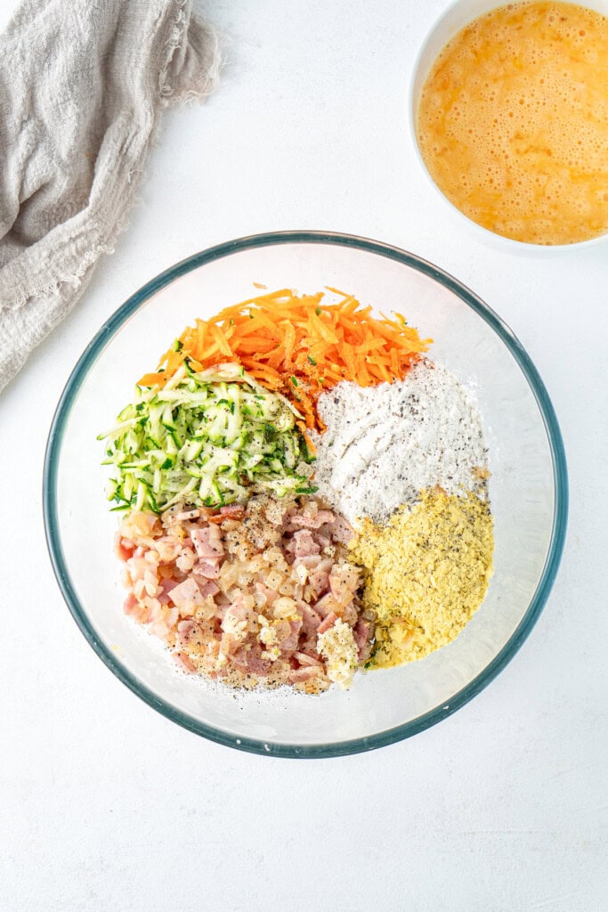 All ingredients in a large glass mixing bowl.