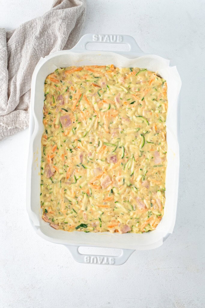 The batter in a rectangular baking dish.