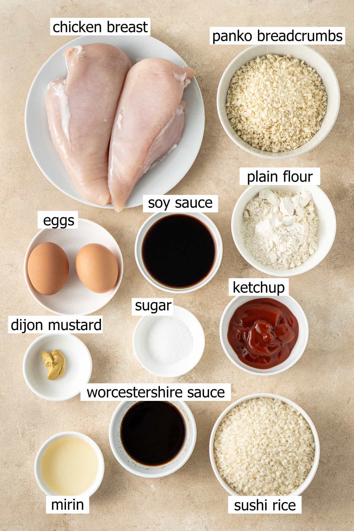 All ingredients needed to make chicken katsu rice bowls with tonkatsu sauce.