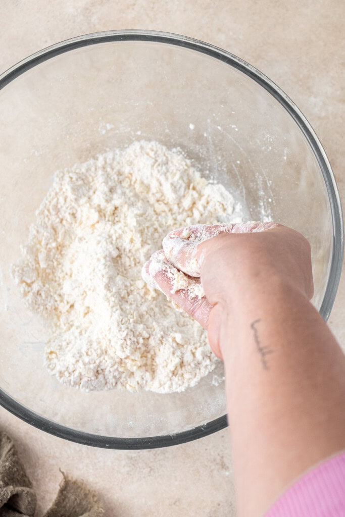 Rubbing the butter into the flour.