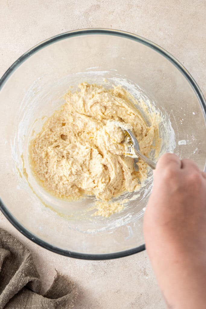 The soft and sticky dumpling batter in a bowl.