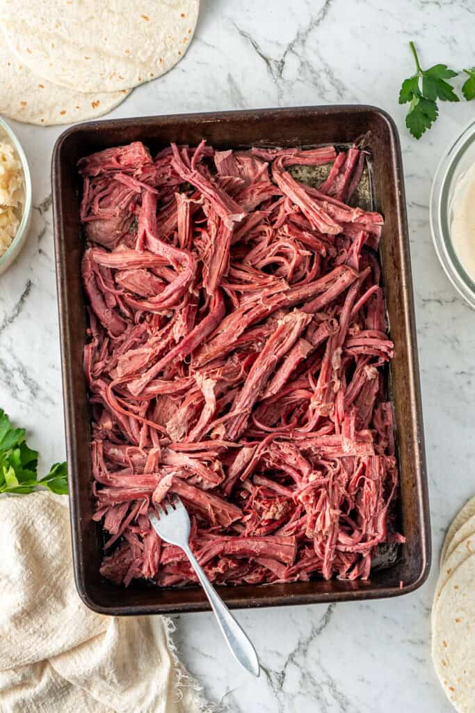 The shredded corned beef.