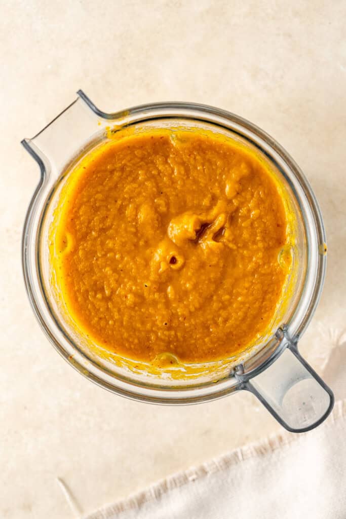 The thick soup in the jug of a blender.