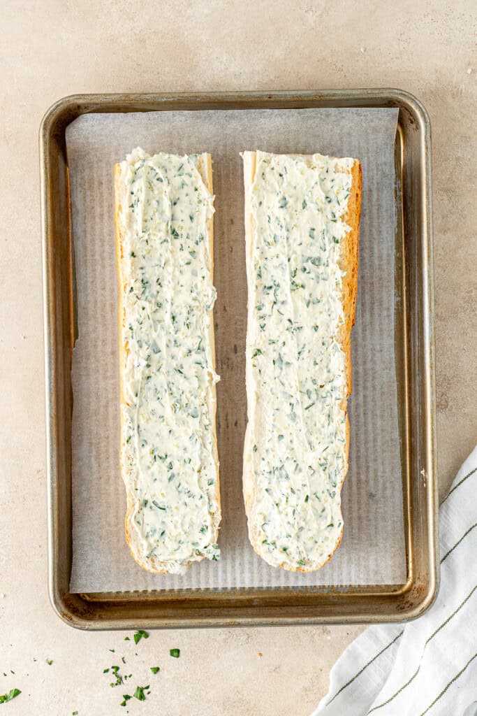 The garlic bread on a oven tray ready to bake.