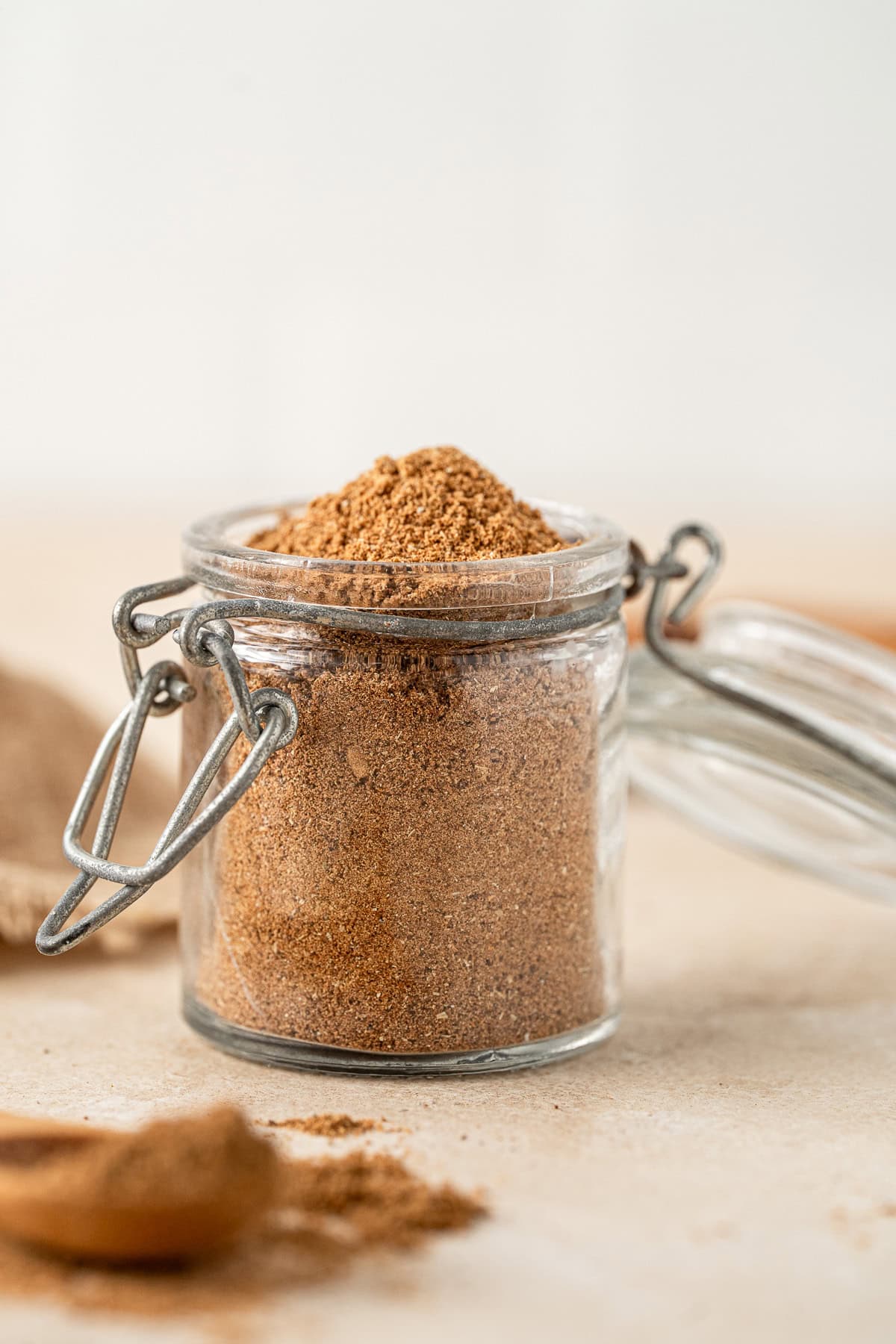 The chai spice transferred to a small glass jar.