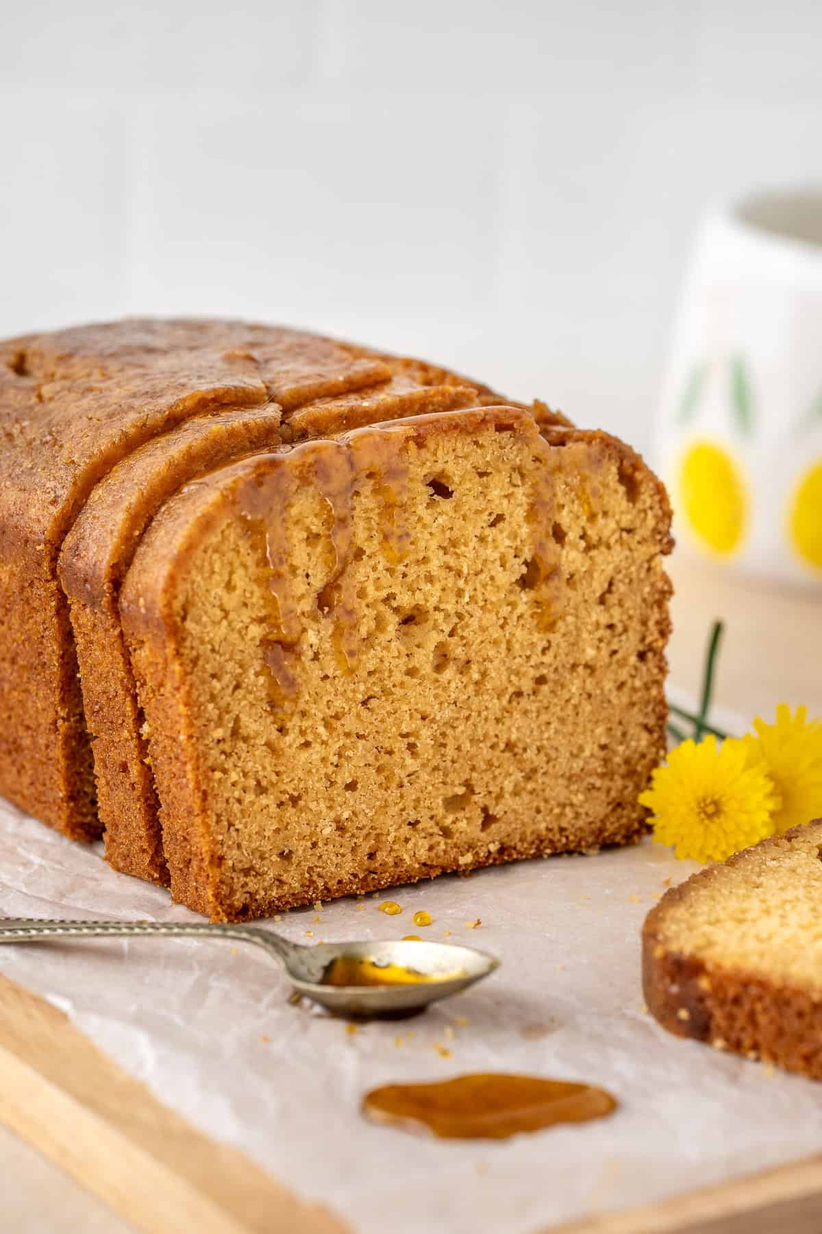 A close up of slices of golden syrup cake.