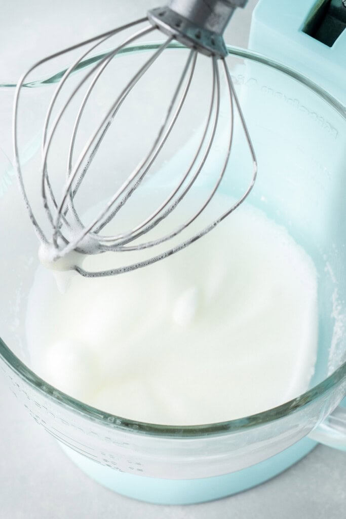 The egg whites at soft peaks stage.