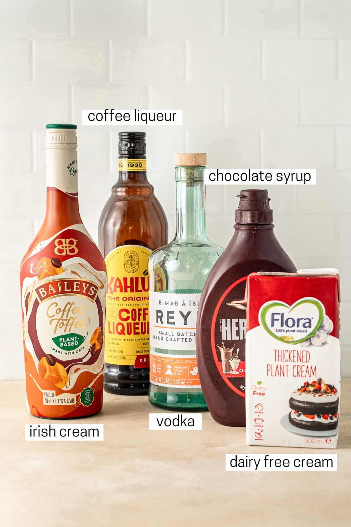 All ingredients needed to make a dairy free mudslide cocktail.