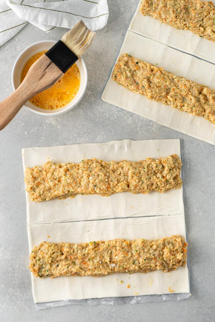 The chicken mince filling on the sheets of pastry.