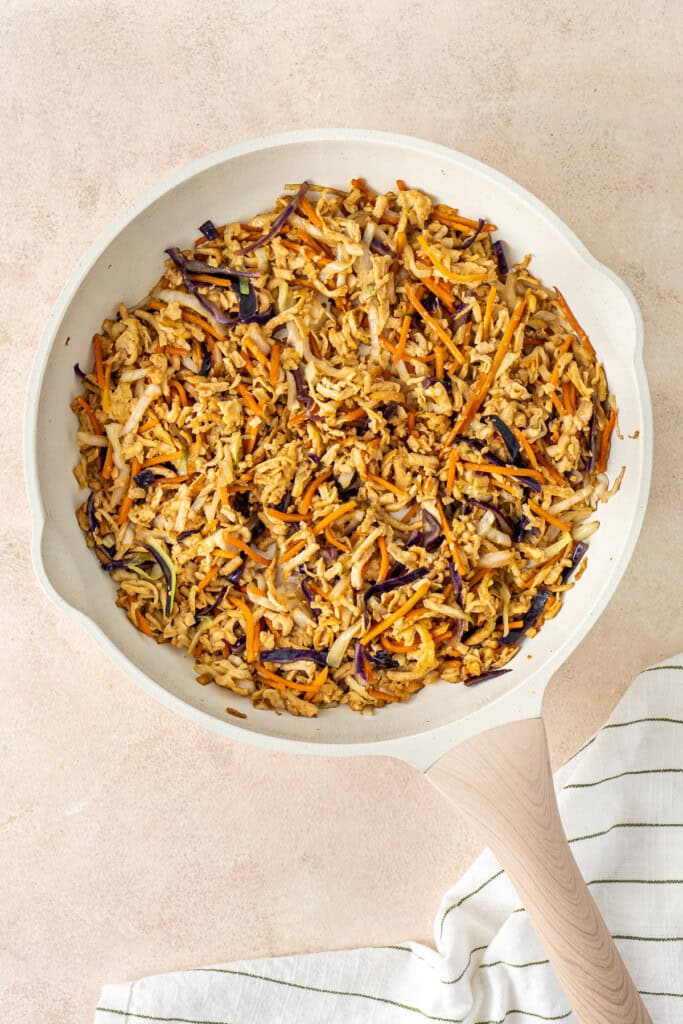 The cooked filling in a frying pan.