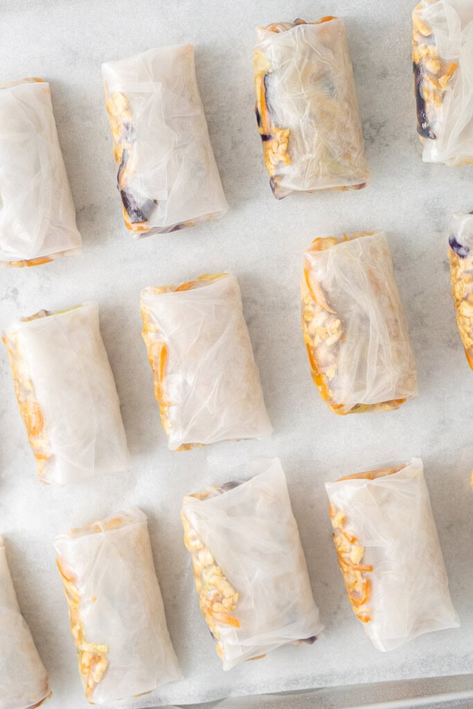 The wrapped dumplings on a tray.