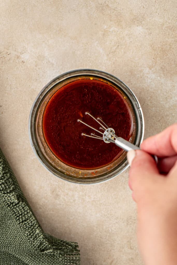 Mixing up the dressing.