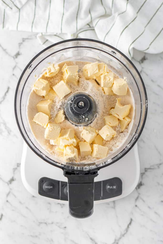 The cubed butter in the food processor. 