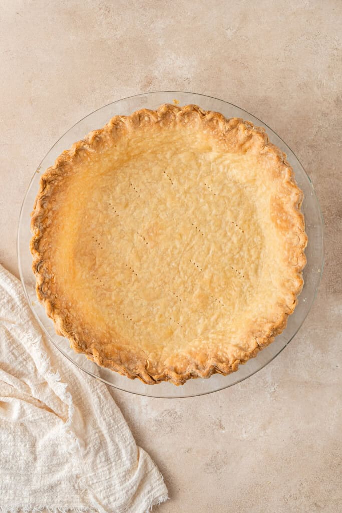 The baked pie crust in the pie dish.