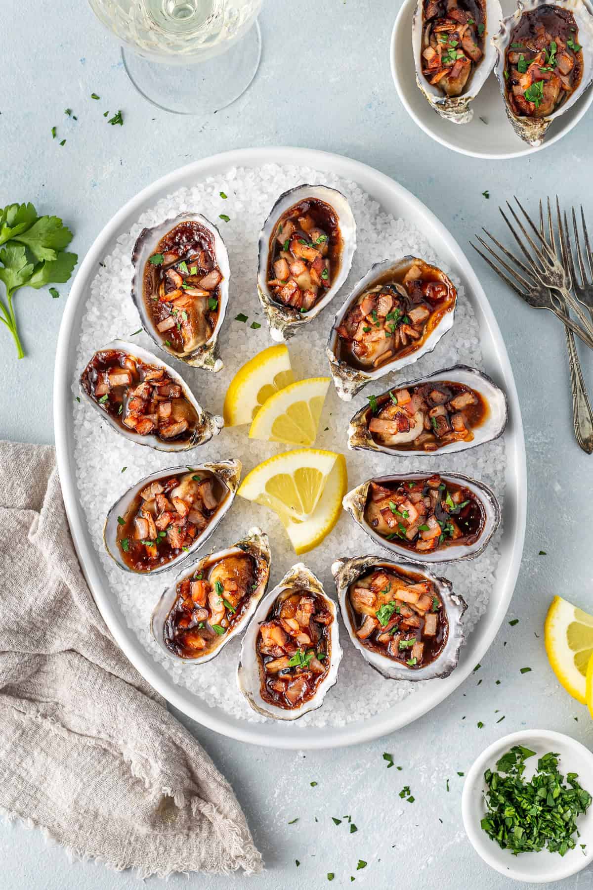 Oyster kilpatrick served on a platter. 